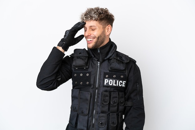 SWAT caucasian man isolated on white background has realized something and intending the solution