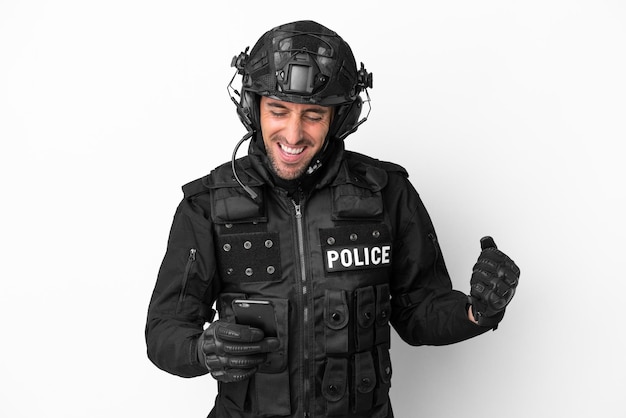 SWAT caucasian man isolated on white background surprised and sending a message