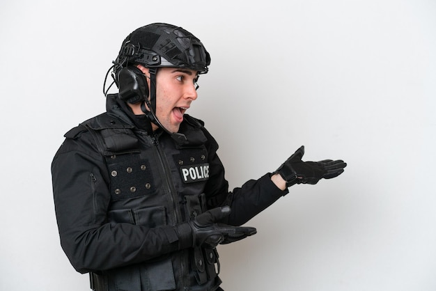 SWAT caucasian man isolated on white background with surprise facial expression