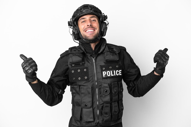 SWAT caucasian man isolated on white background with thumbs up gesture and smiling