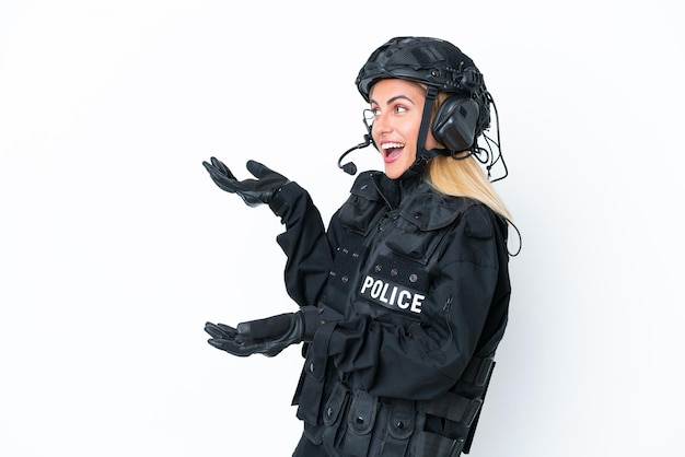 SWAT caucasian woman isolated on white background with surprise facial expression