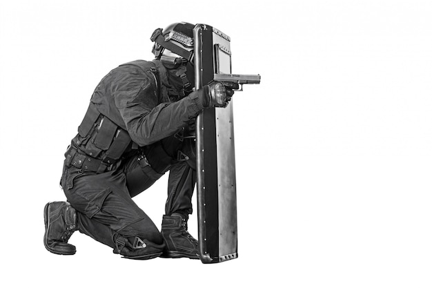 SWAT officer with ballistic shield