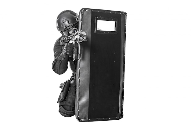 SWAT officer with ballistic shield