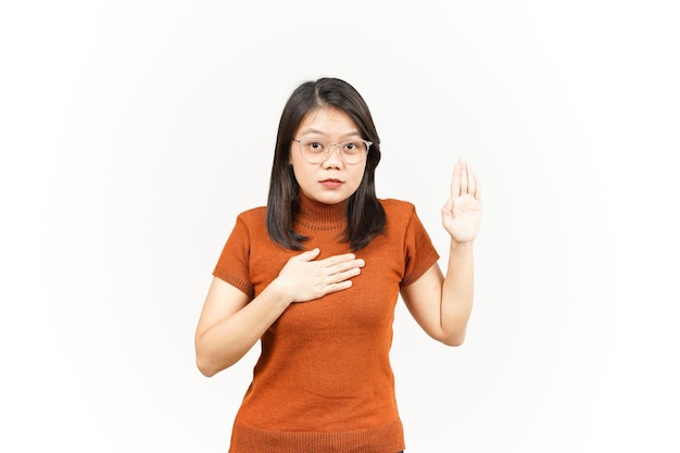 Swearing or Promise Gesture Of Beautiful Asian Woman Isolated On White Background