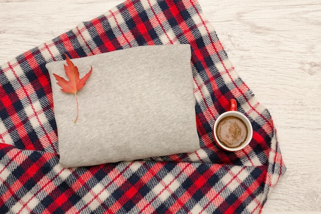 Foto maglione con tazza da caffè