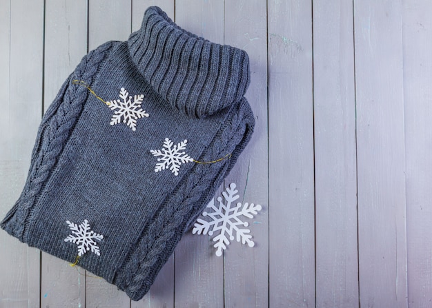 Sweater on  wooden background