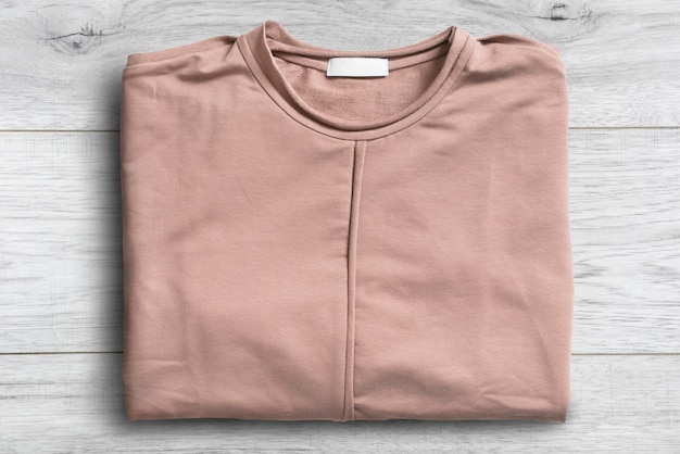 Sweatshirt on wood background