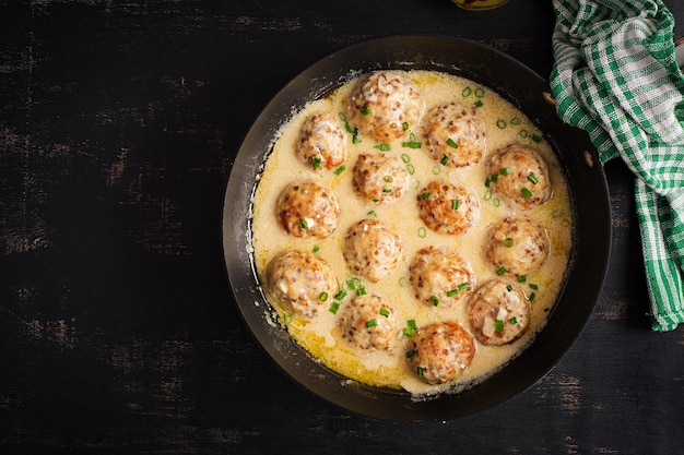 Swedish meatballs in cream sauce Swedish cuisine Turkey meatballs Top view flat lay