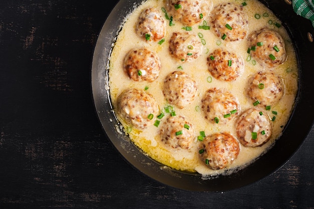 Swedish meatballs in cream sauce Swedish cuisine Turkey meatballs Top view flat lay