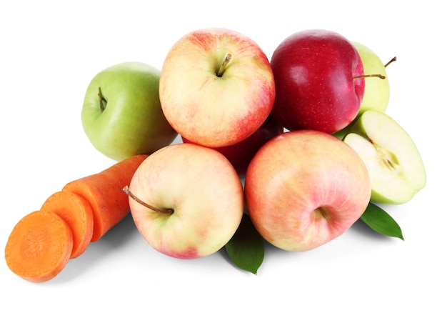 Sweet apples and carrot isolated on white