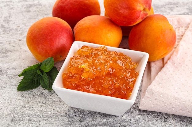 Sweet apricot jam homemade dessert in the bowl