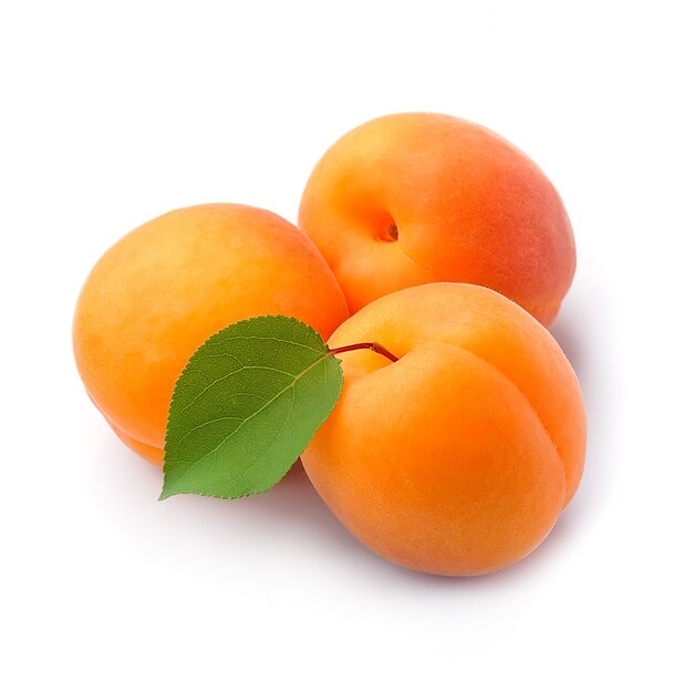 Sweet apricots isolated on white