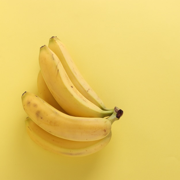 Sweet bananas on punchy pastel yellow