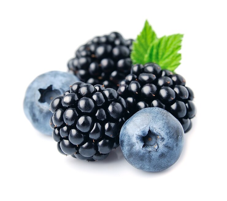 Sweet berries mix isolated. Ripe blackberries and blueberries.