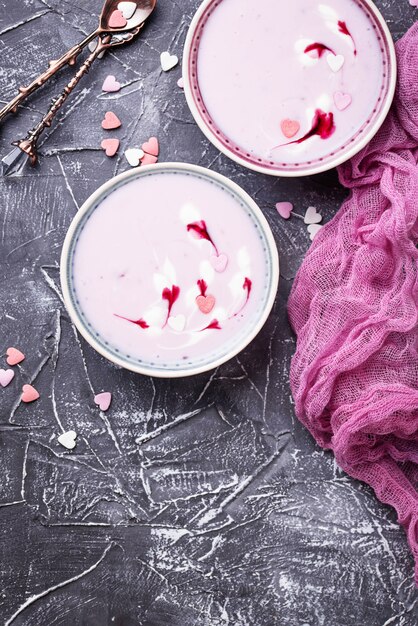 Sweet berry smoothies in bowls. Healthy dessert