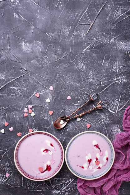 Sweet berry smoothies in bowls. Healthy dessert