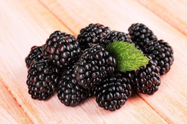 Sweet blackberries on table closeup