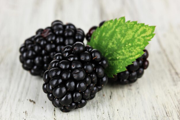 Sweet blackberries on table closeup