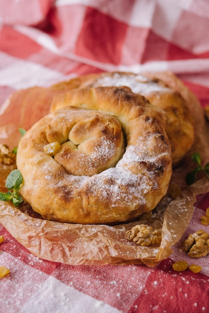 Sweet bun with jam and walnuts