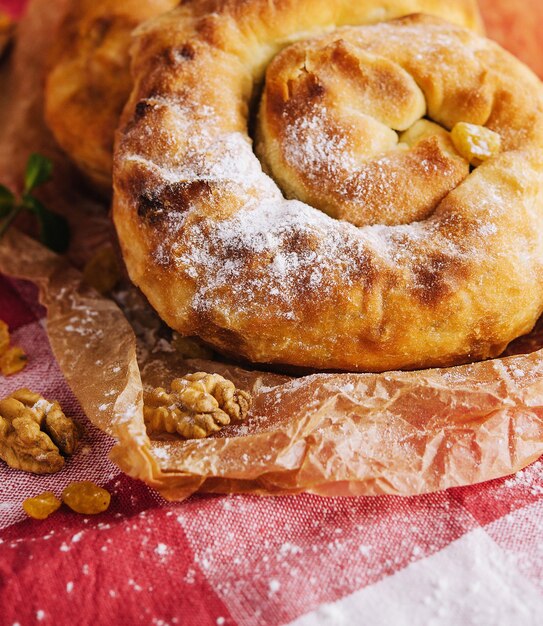 Sweet bun with jam and walnuts