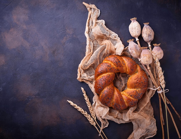 Sweet bun with poppy seeds. 