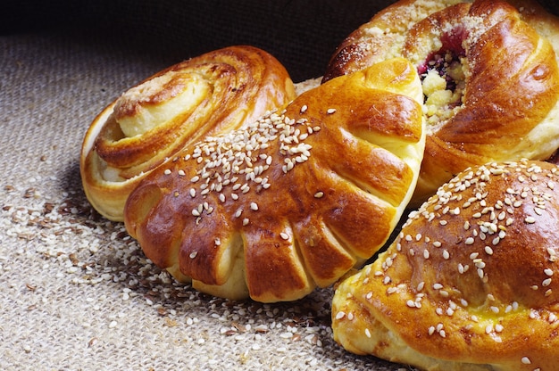 Sweet buns with flax seeds closeup