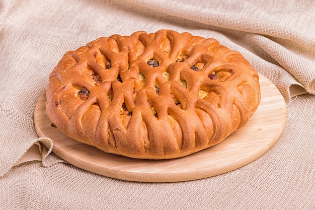 Sweet buns on a wooden board 