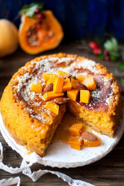 Sweet cake with pumpkin and cinnamon. Fragrant Autumn pastry at home. Copy space