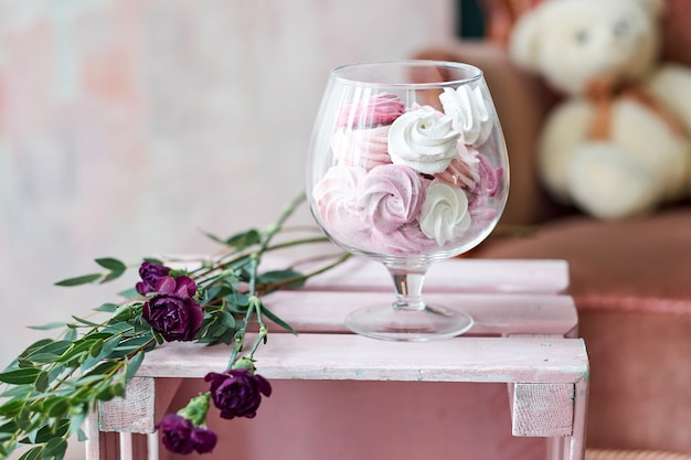 Sweet cakes in a glass vase.. Gift in a beautiful package