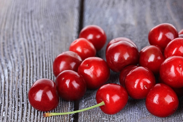 Sweet cherries on wooden background