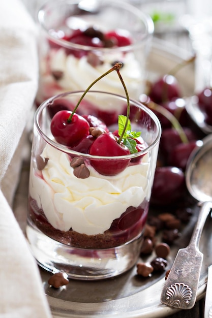 Sweet cherry cheesecake in a glass