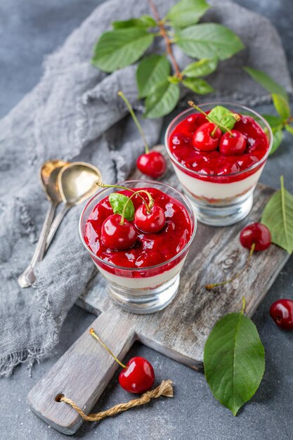 Sweet cherry cheesecake in glasses