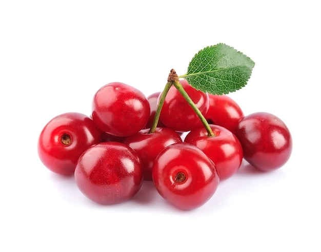 Sweet cherry fruits with leaves isolated.