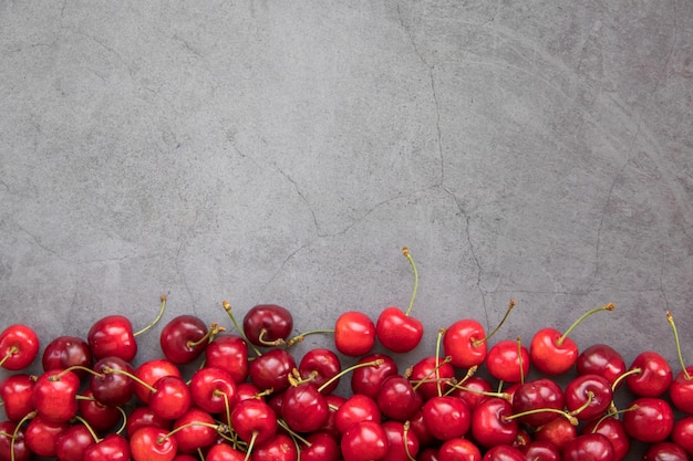 Photo sweet cherry ripe cherries cherry red view from above fruit background