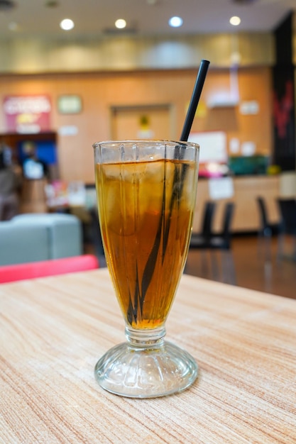 sweet cold iced tea in a transparent glass