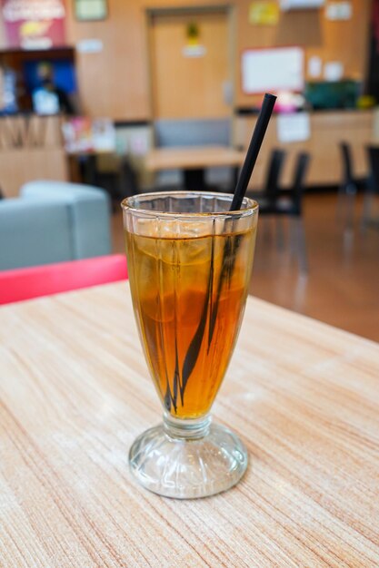 sweet cold iced tea in a transparent glass