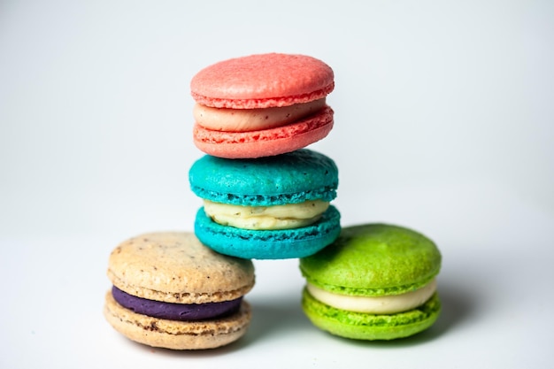 Sweet colorful macarons isolated on white background Tasty colourful macaroons High quality photo