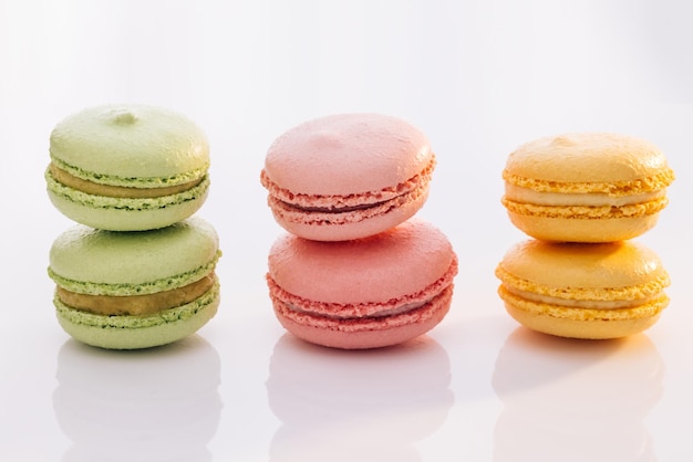 Sweet colorful macarons isolated on white background tasty colourful macaroons