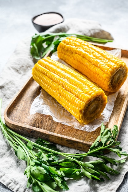 Sweet corn on the cob. Organic farm vegetables.