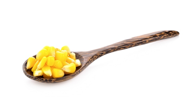 Sweet corn seeds in wood spoon