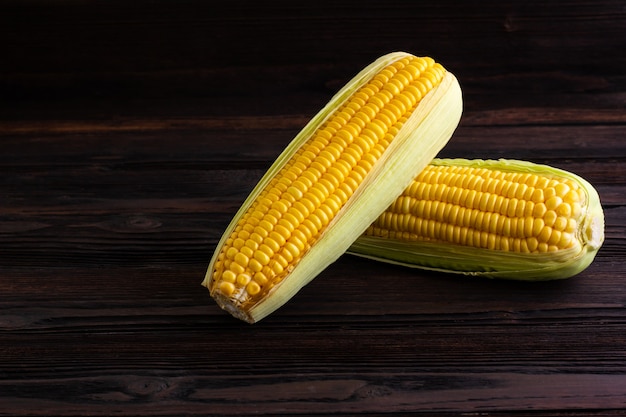 Sweet Corn on wooden table background. 