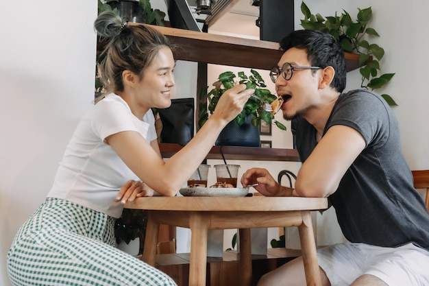 Sweet couple lover flirting date in the cafe