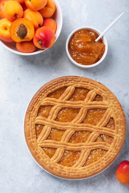 Sweet crust cake with apricots and apricot jam