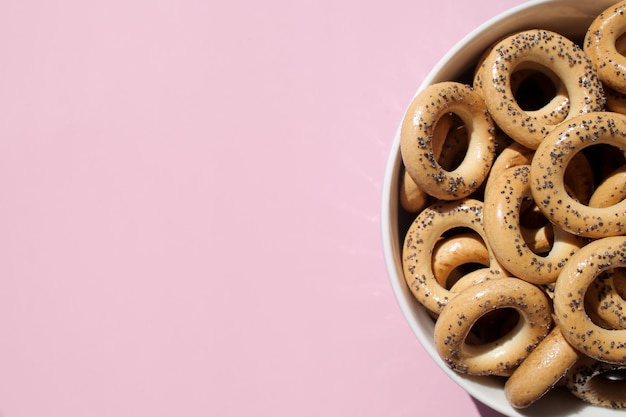 Sweet delicious freshly baked donuts on a bright and colorful background