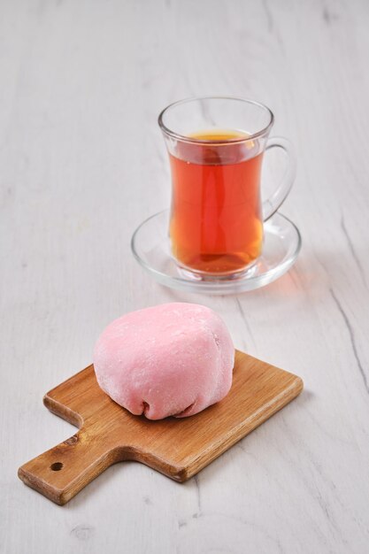 Sweet dessert mochi with strawberry with fruit tea