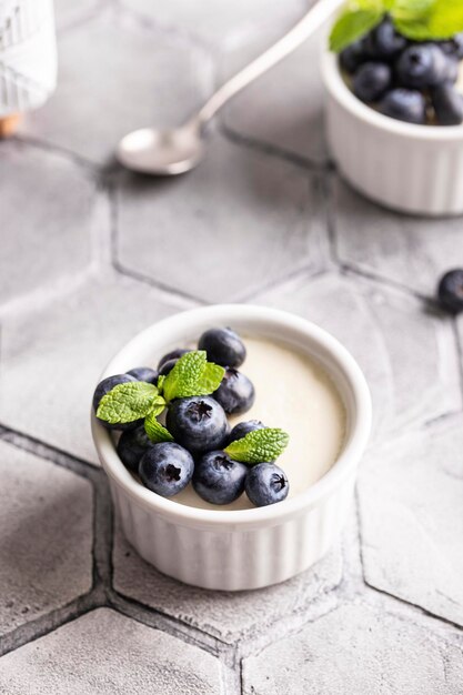 Sweet dessert vanilla panna cotta with blueberries