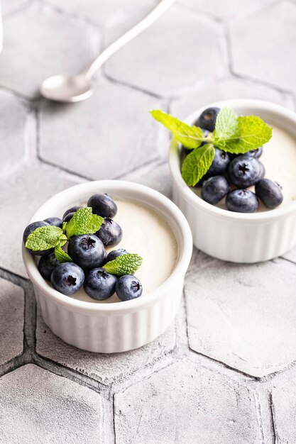 Sweet dessert vanilla panna cotta with blueberries