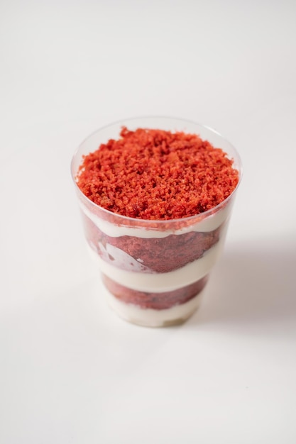 Sweet dessert with berries in a disposable bowl food delivery