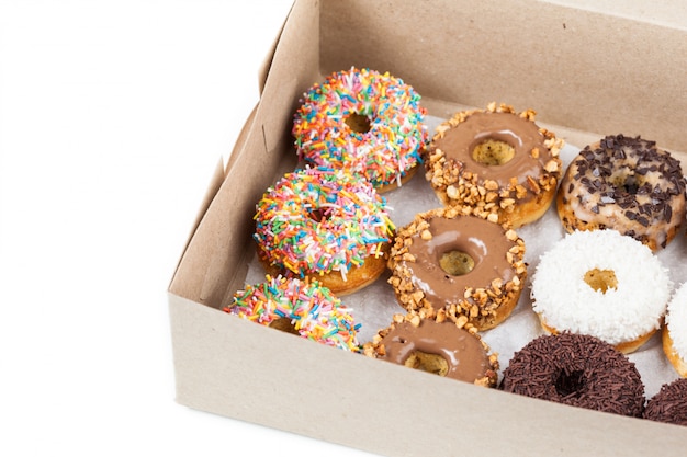 Sweet donuts in a paper box