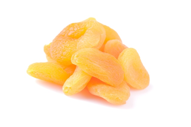 Sweet dried apricots on a white background isolated